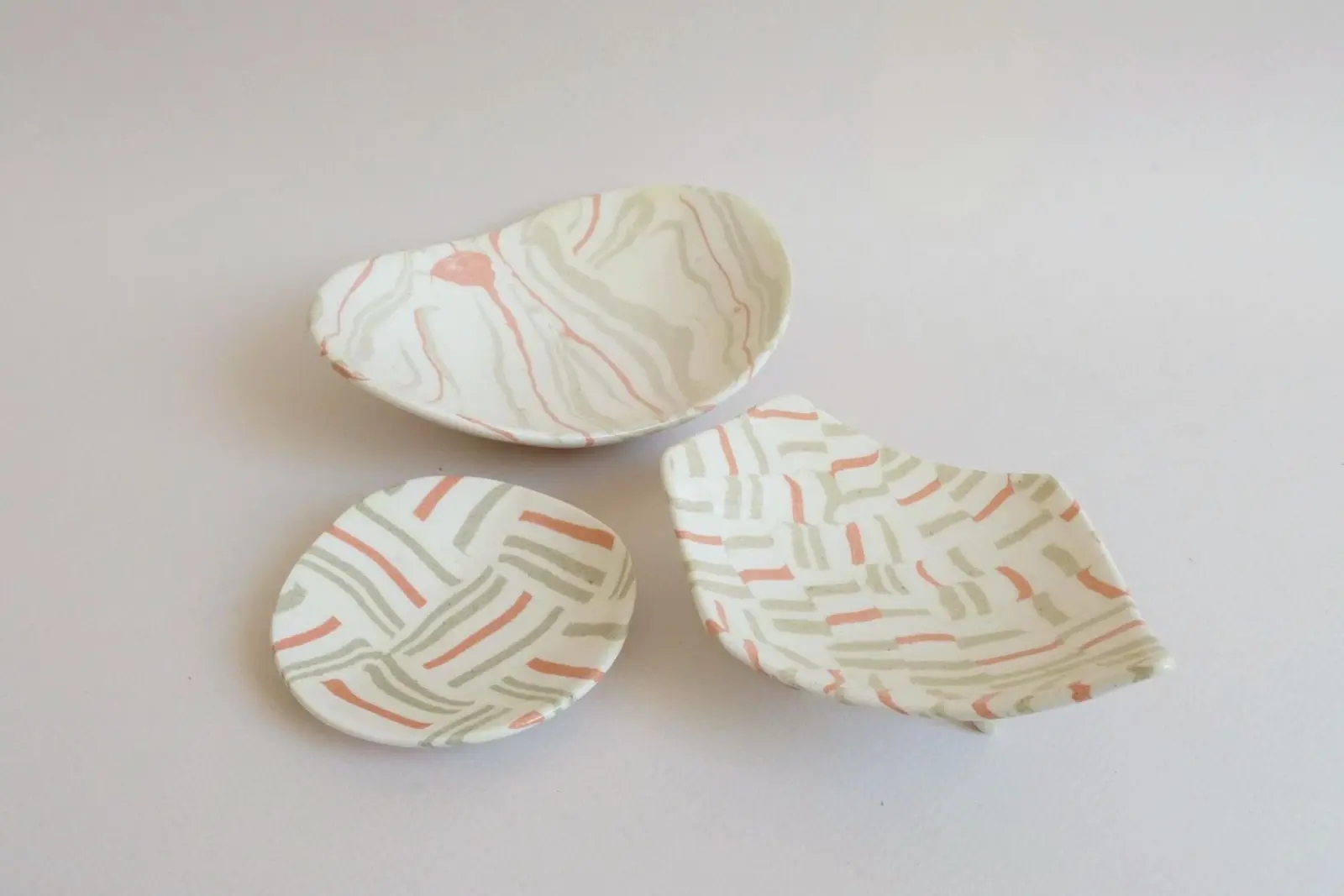 Handmade ceramic plates created with the Japanese Nerikomi technique